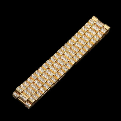 Close-up of gold diamond president bracelet with micro pavé hand-set stones